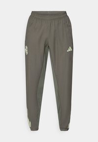 Gray athletic pants with an elastic waistband, featuring a textured finish and contrasting green side accents. Includes a logo detail.