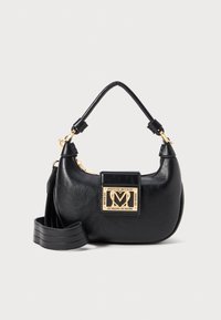 Black leather Love Moschino handbag with gold logo plaque, short handle, and detachable long strap, displayed on white background.