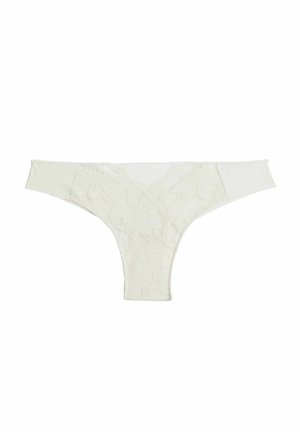 Chiloți tanga albi, cu un design din dantelă florală, material neted și un vârf în formă de V. Partea din spate are o finisare fără cusături pentru confort.