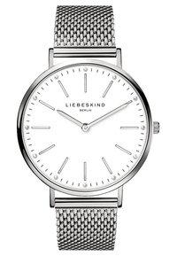 Montre à bracelet en maille argentée avec un cadran blanc rond, présentant des index argentés, trois cristaux et un design minimaliste. Marque : Liebeskind.
