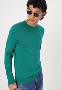 Tommy Jeans RYAN STRAIGHT - Slim fit jeans - denim dark