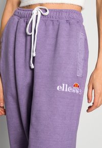 Ellesse VELAM - Calças de fato de treino - purple