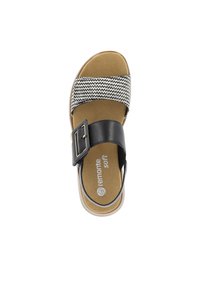 Sorte og hvide mønstrede sandaler med bred rem, metallås og polstret sål med "remonte soft" logo.