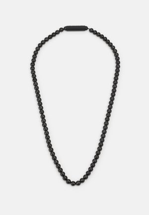 Zwarte kra necklace met gladde, ronde kralen met een matte afwerking; inclusief een cilindrische zwarte sluiting voor een veilige sluiting.