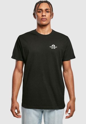 Black cotton t-shirt with a crew neckline and short sleeves. Features white text "The Root of all" with a circular graphic.