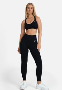SQUATPROOF LEGACY SEAMLESS CROSS BACK - Sujetadores deportivos con sujeción media - black