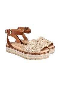 Sandalias de tobillo de cuero marrón con parte superior de textil beige trenzado, suela de yute con plataforma y fondo de goma blanca texturizada. Diseño casual.