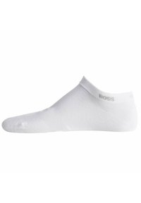 Weiße Knöchelsocke aus einem weichen Baumwollgemisch. Verfügt über ein geripptes Bündchen und dezente Markenkennzeichnung an der Ferse. Schlichtes, nahtloses Design.