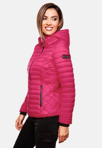 Pink quilted puffer jacket with a hood, zippered front, and black accents. Features a logo on the left sleeve and fitted cuffs.