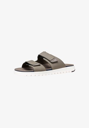 Sandale slide grise pour homme avec deux brides ajustables et semelle blanche rembourrée, conçue pour un usage décontracté.