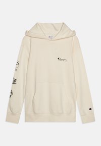 Roomkleurige hoodie met een voorzak, voorzien van bedrukte ontwerpen op beide mouwen en een klein logo op de borst. Gemaakt van zachte stof.