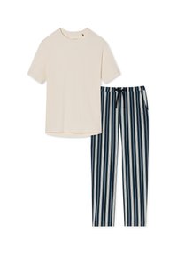 Beige Baumwoll-T-Shirt mit kurzen Ärmeln, kombiniert mit marineblauen gestreiften Hosen mit elastischem Bund und Kordelzug, die für Komfort entworfen sind.