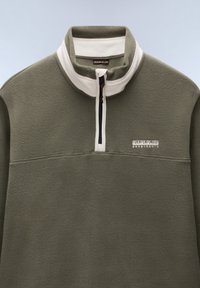 Olive green fleece quarter-zip pullover with white collar, front zipper, and embroidered logo centered below the collar. Smooth texture.
