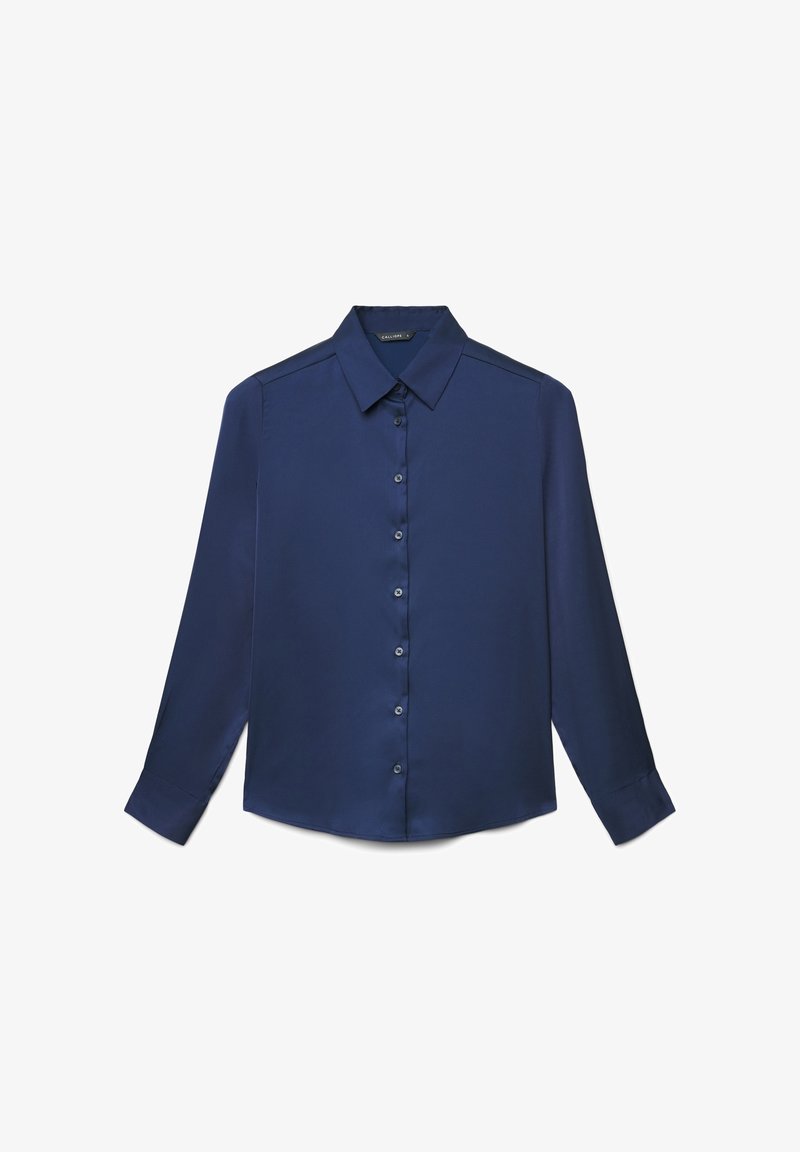 Chemise boutonnée bleu marine en tissu lisse, dotée d'un col classique, de manches longues et d'un léger éclat. Six boutons de fermeture sur le devant.