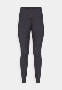 Leggings neri a vita alta realizzati in tessuto elasticizzato, caratterizzati da una superficie liscia e una vestibilità aderente con cuciture minime.