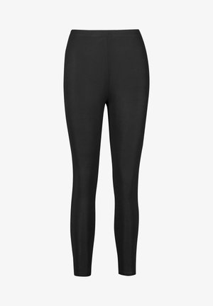 Leggings noirs en tissu extensible, présentant un design moulant et une texture lisse. Aucun détail de ceinture visible.