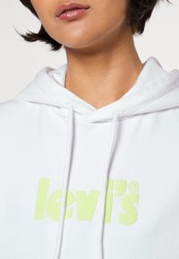 Levi's® GRAPHIC STANDARD HOODIE - Sweatshirt com capuz - bright white