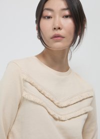 Calliope Felpa - crema