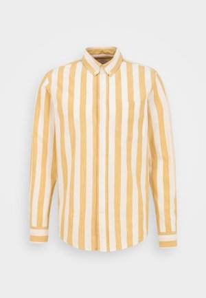 Men's long-sleeve button-up shirt with vertical beige and white stripes and a chest pocket on a plain background.