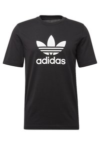 Černé bavlněné tričko s kulatým výstřihem a krátkými rukávy. Obsahuje velké bílé logo Adidas a tři bílé pruhy nad logem.