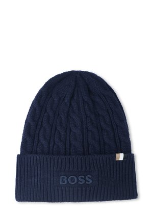 Knitted beanie in dark navy blue with a ribbed cuff and cable-knit design. Features an embossed "BOSS" logo on the front.