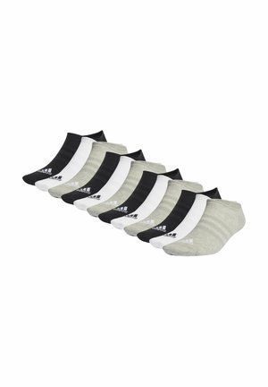 Tio par låga strumpor i svart, vitt och grått, med enfärgade mönster och subtila ränder, tillverkade av ett mjukt, stretchigt material.