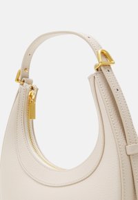 Coccinelle WHISPER - Handbag - white