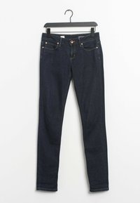Mörkblå denimjeans med slim fit, med fem fickor, kontrasterande orange sömnad och ett bronsfärgat knäppningssystem.