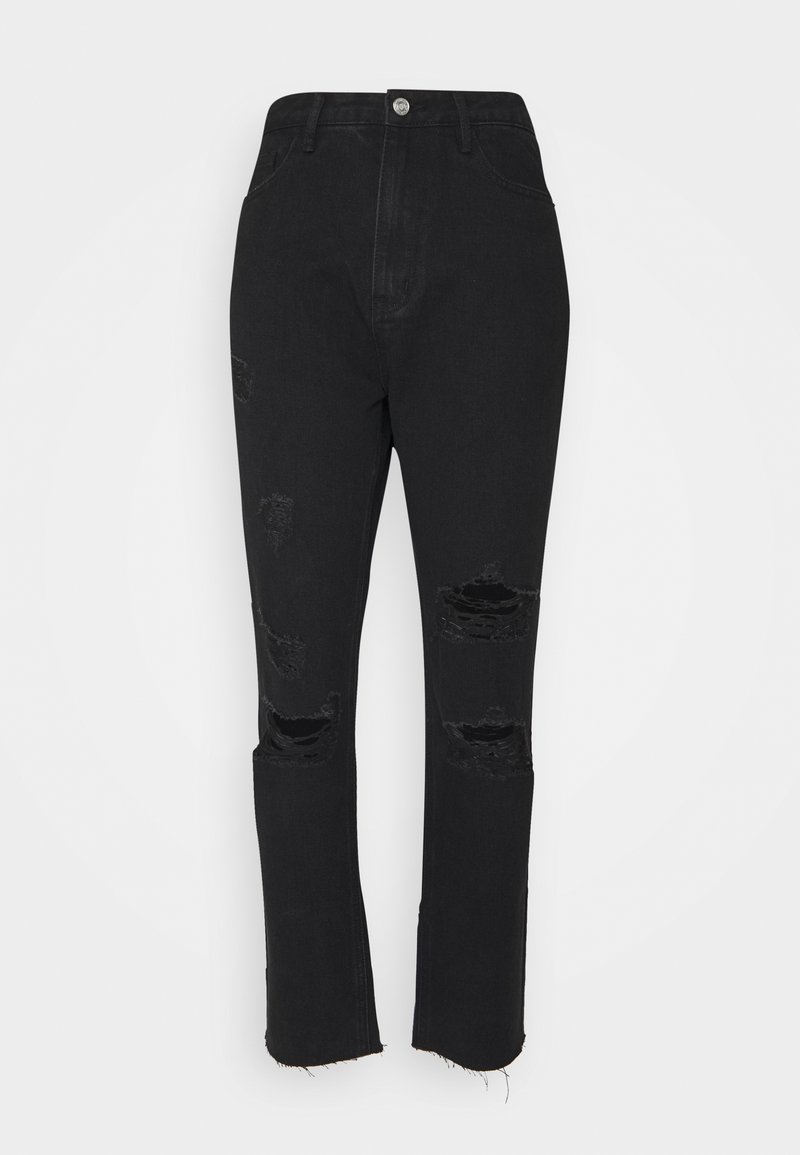 Jean noir taille haute avec déchirures usées aux cuisses et aux genoux, fermeture par bouton et ourlet brut aux chevilles.