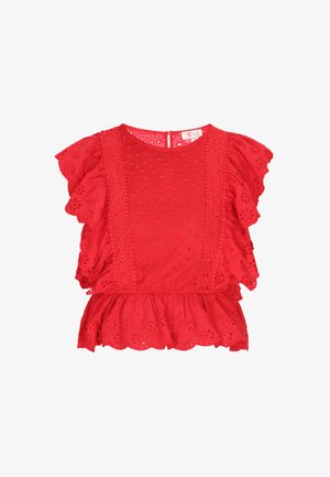 Punane puuvillane pluus volangdetailidega varrukatel, augulise mustriga ja lainelise äärisega. Omab ümmargust kaela ja tagumist nööbitamist.