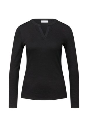 Chemise noire à manches longues côtelée avec un petit col en V, silhouette ajustée, sans boutons ni motifs visibles.