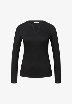 Chemise noire à manches longues côtelée avec un petit col en V, silhouette ajustée, sans boutons ni motifs visibles.