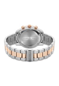 Silver och roséguld rostfritt stål armbandsur med en matt armband, rund klockkåpa och dubbla knappar på toppen. Graverad logotyp på baksidan.