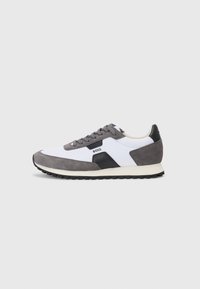 Gray and white sneakers with a suede and synthetic material blend. Features black accents, round laces, and a textured black rubber sole.