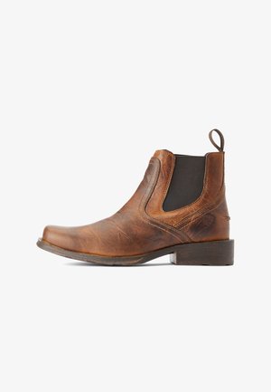 Braune Leder-Chaussures mit runder Zehenform, elastischen Seitenpanelen und einer kleinen Zuglasche; strukturierte Oberfläche und subtile Nähdetails.