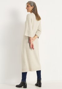Cellbes of Sweden WITH HIGH SLIT - Neulemekko - light beige melange