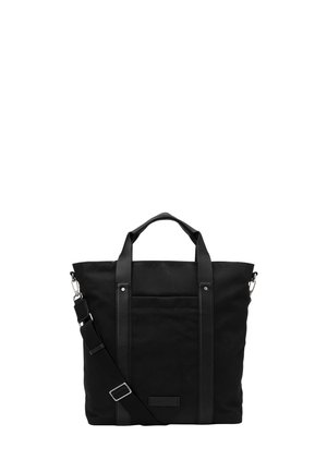 Schwarze Tragetasche mit zwei Griffen und verstellbarem Schulterriemen, mit Fronttasche und minimalistischem Design auf weißem Hintergrund.