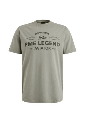 T-shirt gris à manches courtes en coton, avec un texte imprimé en gris foncé. Encolure ronde et coupe décontractée.
