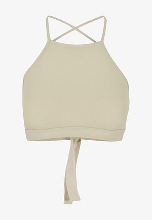 Beige halterneck crop top lavet af glat stof. Har krydsende stropper og en bundet rygdetalje for justerbar pasform.