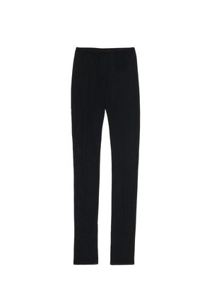 Pantalones negros de corte ajustado con cintura elástica, exhibidos planos sobre un fondo blanco.