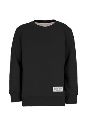 Sort langærmet crewneck sweatshirt med ribbede manchetter og kant, der har et lille rektangulært hvidt mærke nær bunden af kanten.