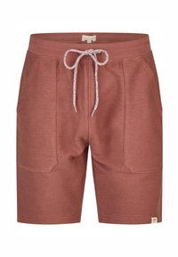 Pantalones cortos color óxido hechos de tela texturizada, con dos bolsillos laterales y una cinturilla con cordón ajustable en color blanco.