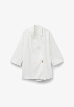 White long-sleeve blazer with wide lapels and a single visible tan button on the front, displayed flat on a white background.