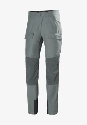 Šedé venkovní kalhoty s cargo kapsami, odolnou texturou, kontrastními tmavými akcenty a přiléhavým střihem pro aktivní nošení.