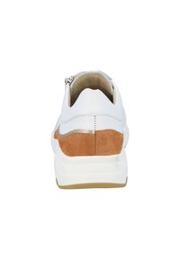 White sneaker with brown suede heel accent, smooth leather upper, metallic detailing, and a textured rubber sole. Rear view shows zip closure.