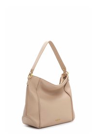 Beżowa skórzana torba o gładkiej fakturze, zaokrąglonym kształcie i pojedynczym pasku na ramię. Charakteryzuje się złotymi elementami metalowymi i detalami szwów.