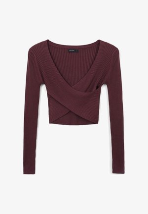 Haut bordeaux à manches longues à côtes, avec un décolleté en V profond et un détail enroulé à l'avant, présentant un tissu texturé et une coupe ajustée.