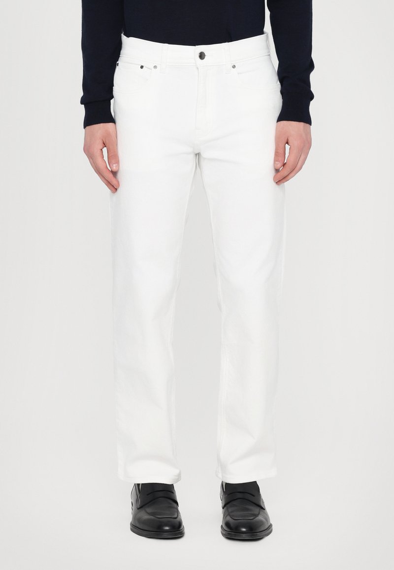 White cotton jeans with a straight-leg design and standard five-pocket style. Features a metal button and zipper closure.
