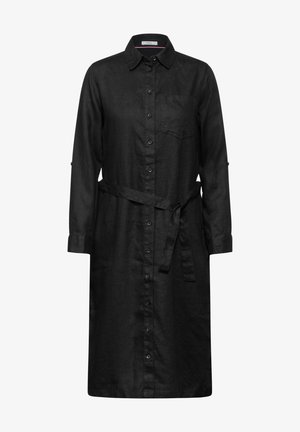 Zwarte linnen shirtjurk met een knoopsluiting aan de voorkant, lange mouwen, borstzak en een bijpassende riem op de taille.
