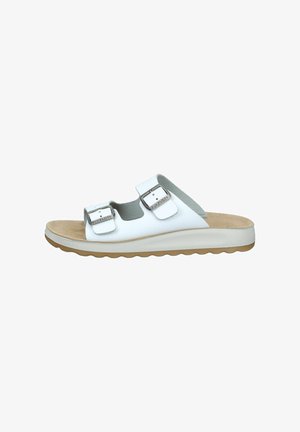 White open-toe sandal with two adjustable buckles, beige cushioned footbed, and textured light brown sole.